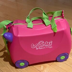 Melissa & Doug Pink Trunki Ride-On Suitcase with Green Accents